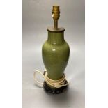 A Chinese green celadon baluster vase, adapted as a table lamp, total height excluding the top