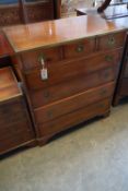 A brass mounted yew wood campaign style chest of three short and four graduated long drawers,