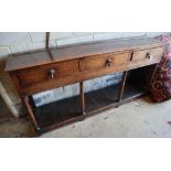 A Georgian oak three-drawer dresser base with potshelf, width 172cmCONDITION: Of good rich colour,