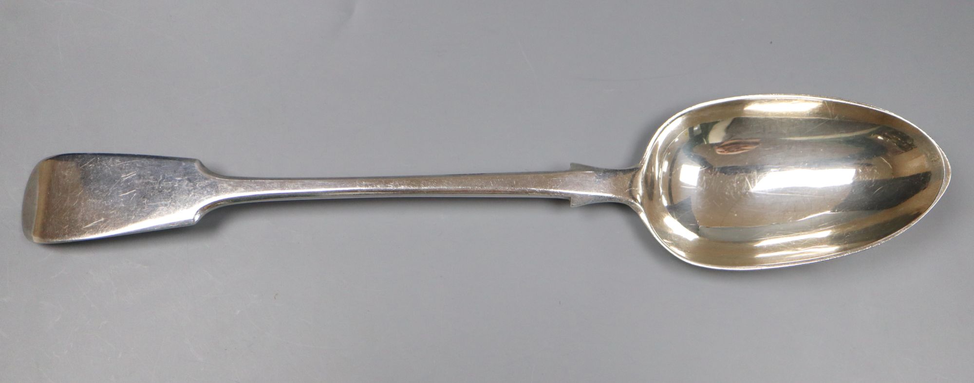 A Victorian silver fiddle pattern basting spoon, George Adams, London, 1876, 30.5cm, 4.5oz.