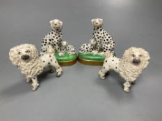 A pair of English porcelain King Charles Spaniels, 6.5cm high and a pair of Continental