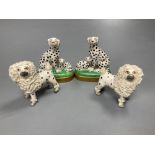 A pair of English porcelain King Charles Spaniels, 6.5cm high and a pair of Continental