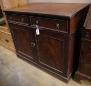 An early Victorian mahogany cabinet, fitted two drawers over panelled doors, width 114cm depth