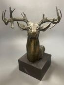 A bronze model of a stag's head, 45cm including plinth