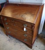 A Georgian mahogany bureau, width 100cmCONDITION: Overall a little faded with scuffs, scratches