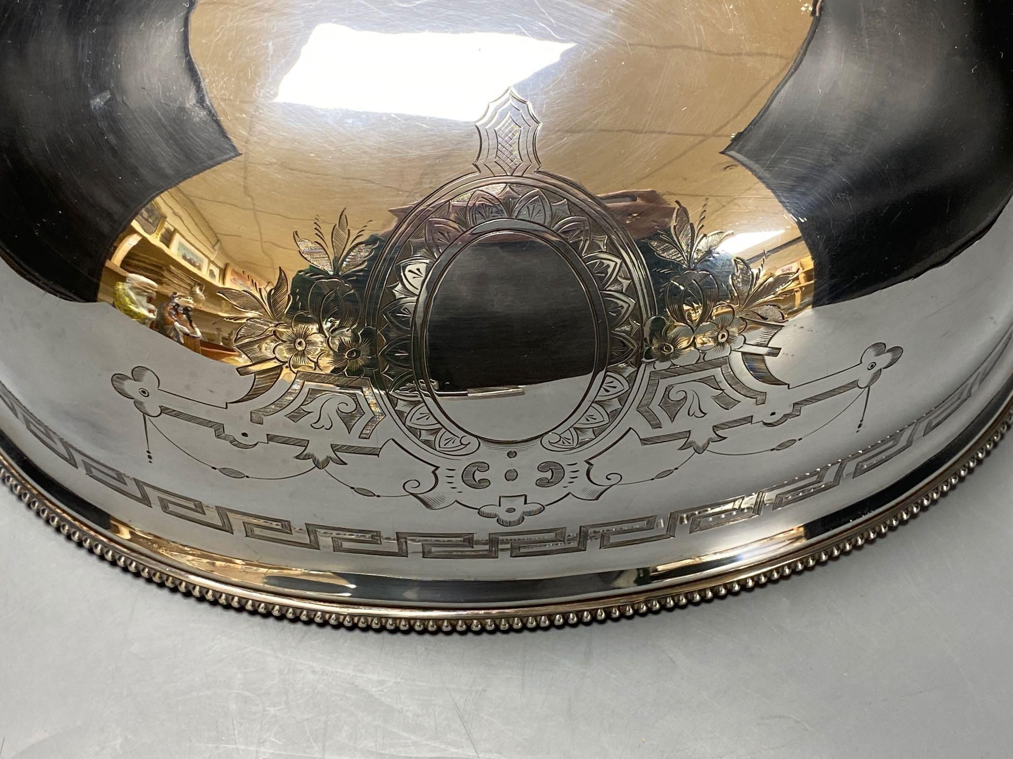 A silver plated engraved meat dome, width 33cmCONDITION: Good condition. - Image 2 of 4