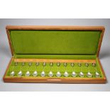 A modern cased set of twelve RHS parcel gilt silver flower spoon set.