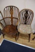 A 19th century ash, beech and elm Windsor wheelback armchair and a Windsor wheelback single