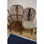 A 19th century ash, beech and elm Windsor wheelback armchair and a Windsor wheelback single