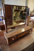 A Regency mahogany five drawer bowfront chest, width 91cm and a mahogany toilet mirror, width