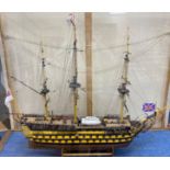 A model of the HMS Victory in perspex case, approximate length 120cm