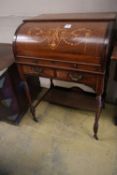 An Edwardian marquetry inlaid rosewood cylinder bureau, width 69cmCONDITION: Suffering from water