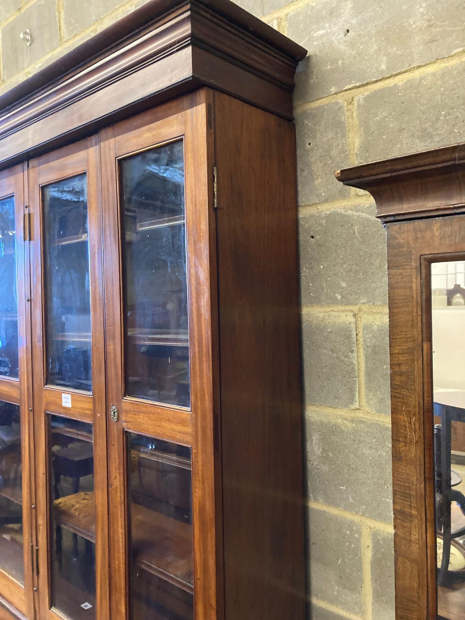 A Victorian mahogany bookcase cupboard, with pull out mid section writing slide, width 144cm depth - Image 4 of 4