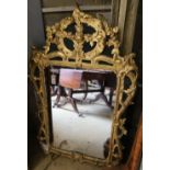 An 18th century style gilt carved wall mirror, width 80cm height 122cm