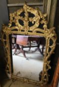 An 18th century style gilt carved wall mirror, width 80cm height 122cm