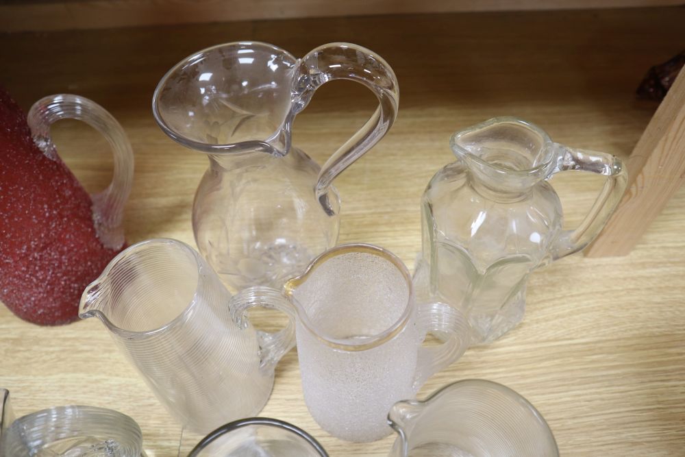 Nine various 19/20th century glass jugs, including a ruby crackle glass jug, tallest 25. - Image 5 of 5