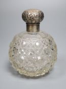 An Edwardian silver topped spherical hobnail cut glass scent bottle, Birmingham, 1907, height 12.