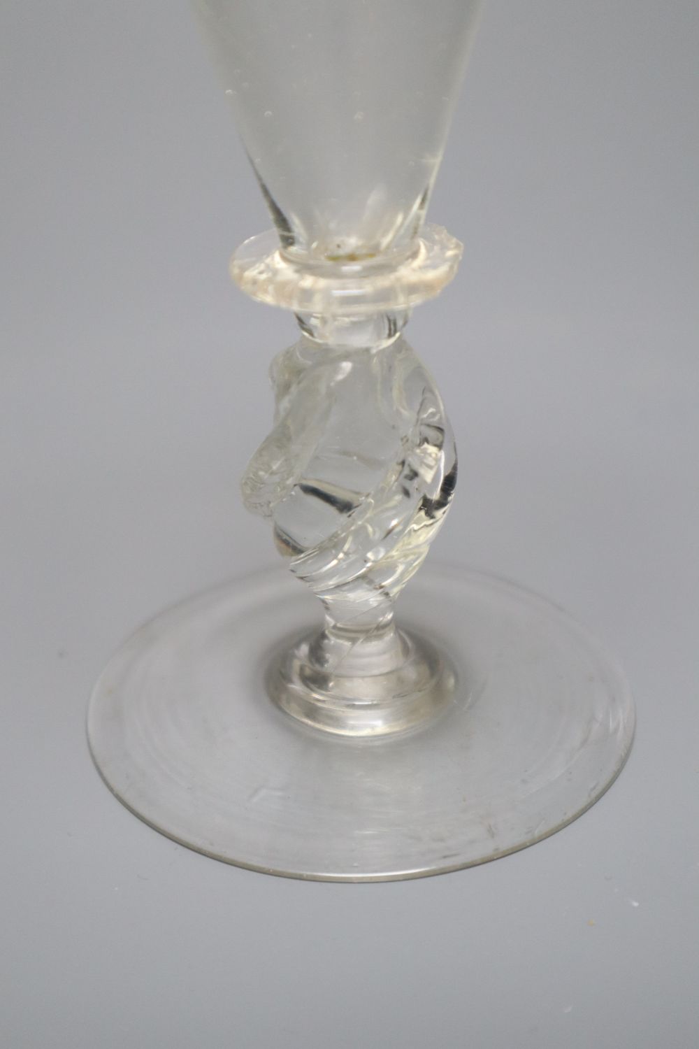 A façon de Venise historismus wine glass, 20th century, the conical bowl above a 'propeller' stem, - Image 3 of 3