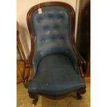 A Victorian mahogany spoonback armchair