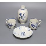 A Worcester Gilliflower pattern fluted coffee cup and saucer, a Narcissus ovoid tea caddy and a