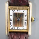 A lady's 925 gilt Cartier Vermeil Tank quartz rectangular wrist watch, with three colour Roman dial,