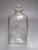 An 18th century glass square section storage bottle, with teared basal shaped stopper, 26.5cm