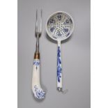 A Bow pistol grip blue and white handled fork, c.1770, 23cm, and a Continental porcelain blue and