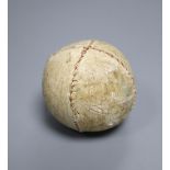 An early hand-stitched sport's ball, 6.5cm diameter