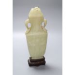 A Chinese bowenite vase and cover, on stand, 19th century, height 27cm excluding standCONDITION: The