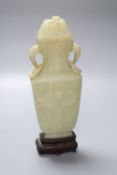 A Chinese bowenite vase and cover, on stand, 19th century, height 27cm excluding standCONDITION: The