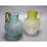 Two Victorian crackle glass jugs, late 19th century, one in turquoise glass with applied amber