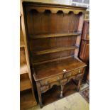 A small 18th century style oak dresser, width 92cm depth 37cm height 164cm