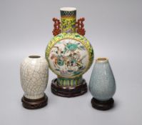 A 19th century small Chinese yellow ground moon flask, 22cm and two crackle glaze vasesCONDITION: