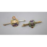 A 9ct gold, white metal and three colour enamel Royal Tank Regiment bar brooch, 47mm, gross 4.3