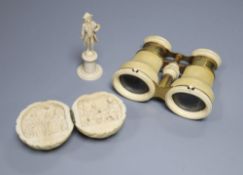 A late 19th century ivory diptych, inscribed, 5.5cm, a German ivory figure, 8cm and a pair of