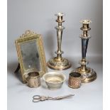 A pair of Sheffield plated candlesticks (worn), a frame, two mugs, a bowl and a pair of grape
