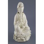 A Chinese Dehua blanc de chine figure of Guanyin, impressed seal to back, 26.5cm highCONDITION: