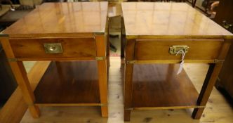 A pair of reproduction military style yew two tier occasional tables, width 48cm depth 61cm height