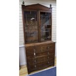 A Regency mahogany secretaire bookcase, width 106cm depth 51cm height 230cm