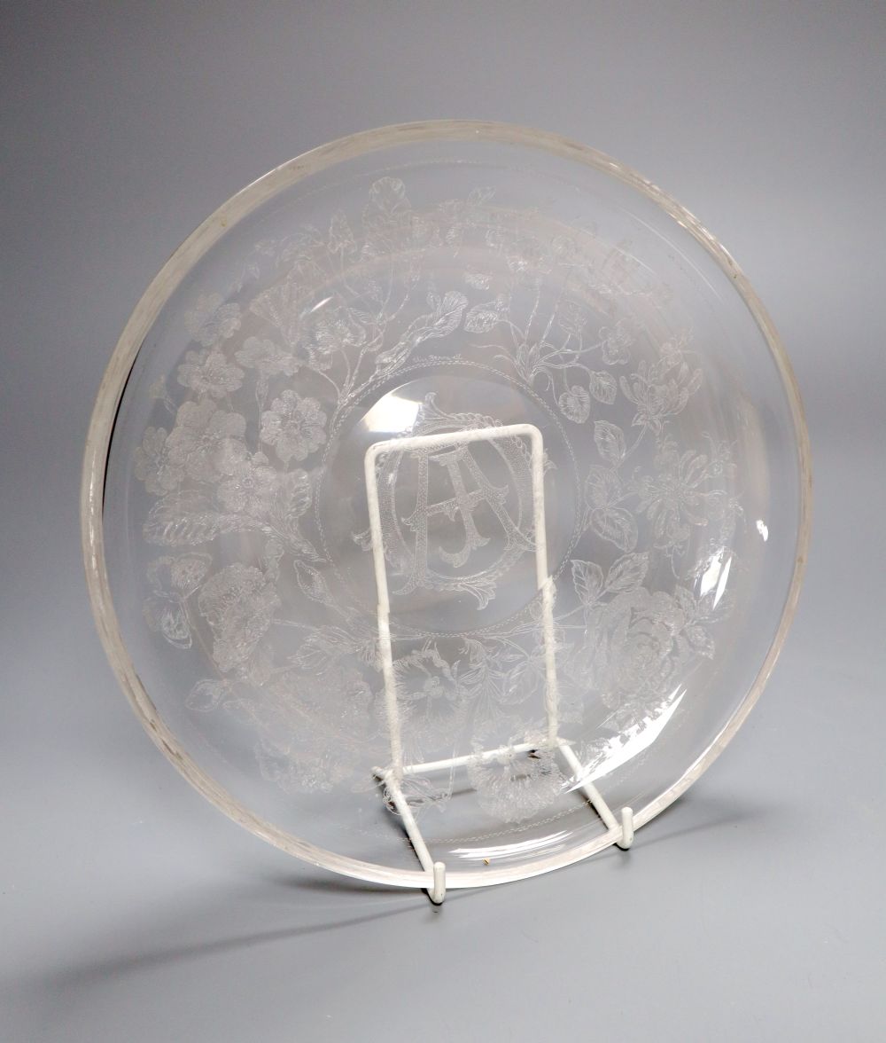 An engraved glass dish by Alice Barnwell, 1950/60s, decorated with with the monogram AJO, flowers