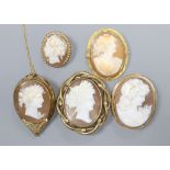 Five assorted mounted cameo shell brooches, including one 9ct gold(gross 12.4 grams) and one 10k(