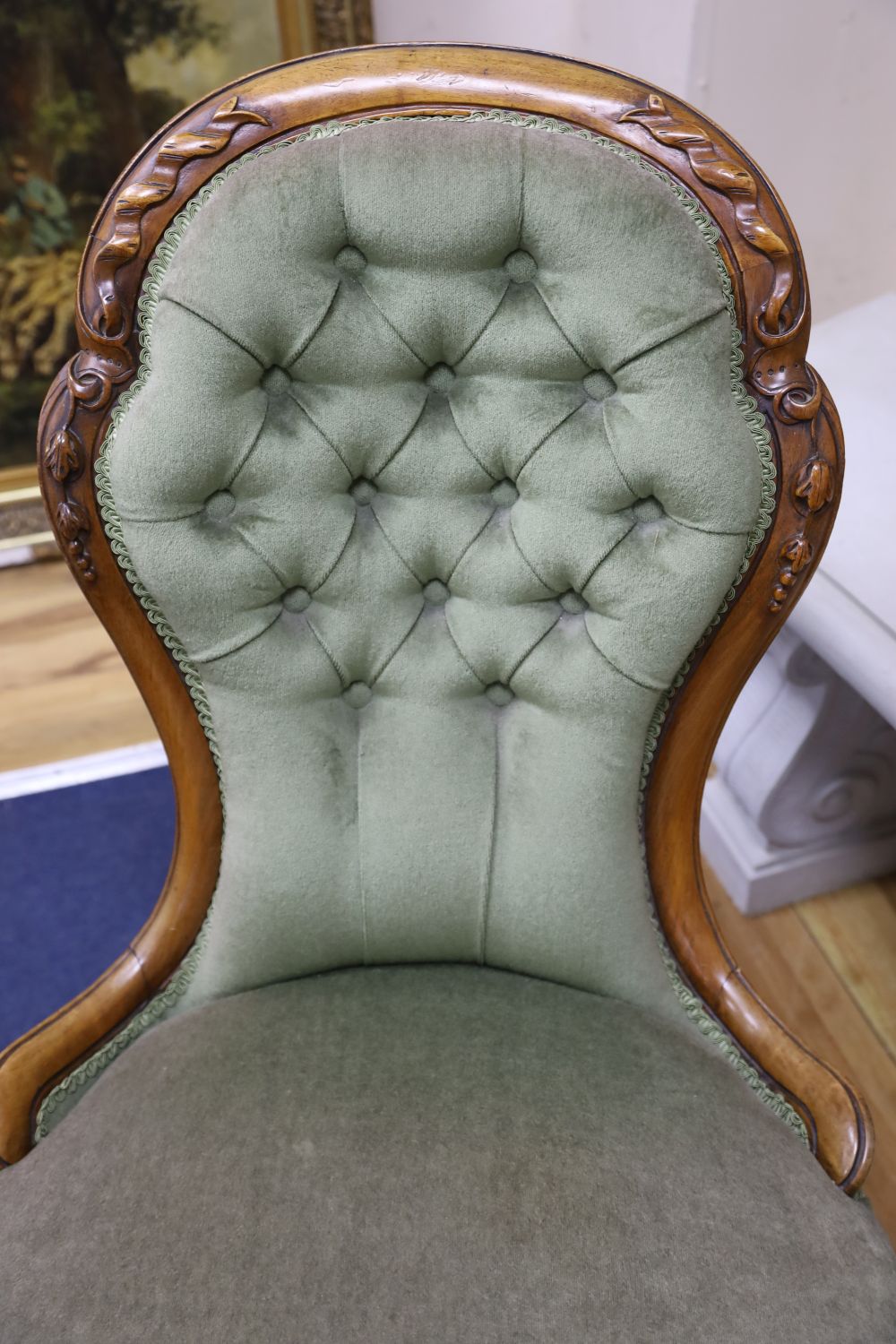 A Victorian carved walnut nursing chair - Image 2 of 4