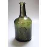 A green glass mallet shaped wine bottle, second half 18th century, sealed RH, 21cm highCONDITION: