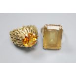 Two 9ct and citrine set dress rings, size L, gross 16.4 grams.CONDITION: Both showing signs of