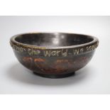 An early 20th century Arts & Crafts 'motto' maizer bowl, diameter 24cm