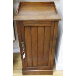 A late Victorian Aesthetic movement walnut bedside cabinet, width 39cm depth 36cm height 76cm