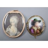 An early 20th century engraved yellow metal mounted oval portrait brooch, 56mm, gross 19 grams and a