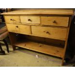 A pine five drawer side cabinet, width 117cm depth 40cm height 87cm