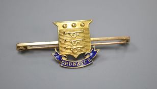 An early 20th century 15ct and enamel 'Army Ordnance Department' bar brooch, 47mm, gross 4.8 grams.