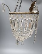 A pair of cut glass lustre drop bag chandeliers